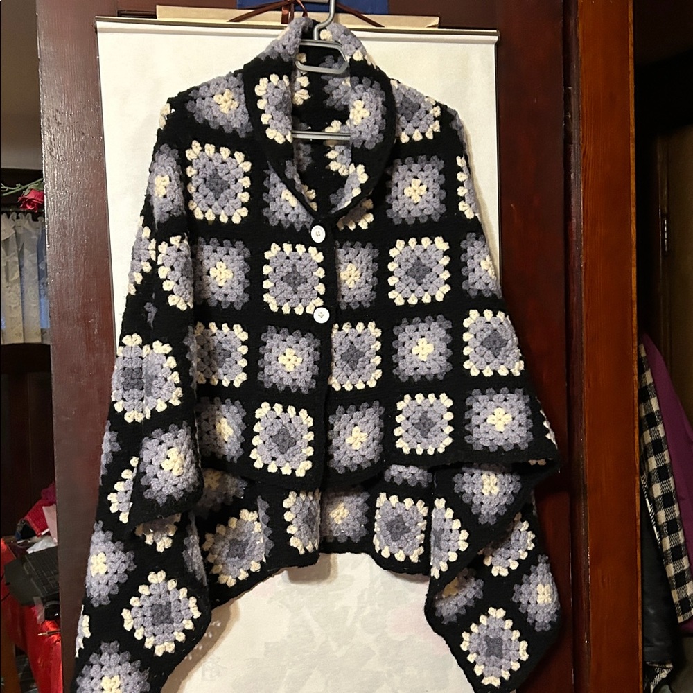 handmade crochet granny square throw blanket in black, white, and grey shades